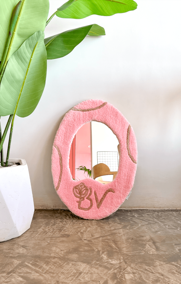 Brand tufted mirror